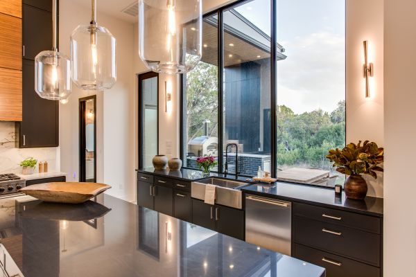 Custom kitchen with large windows above sink